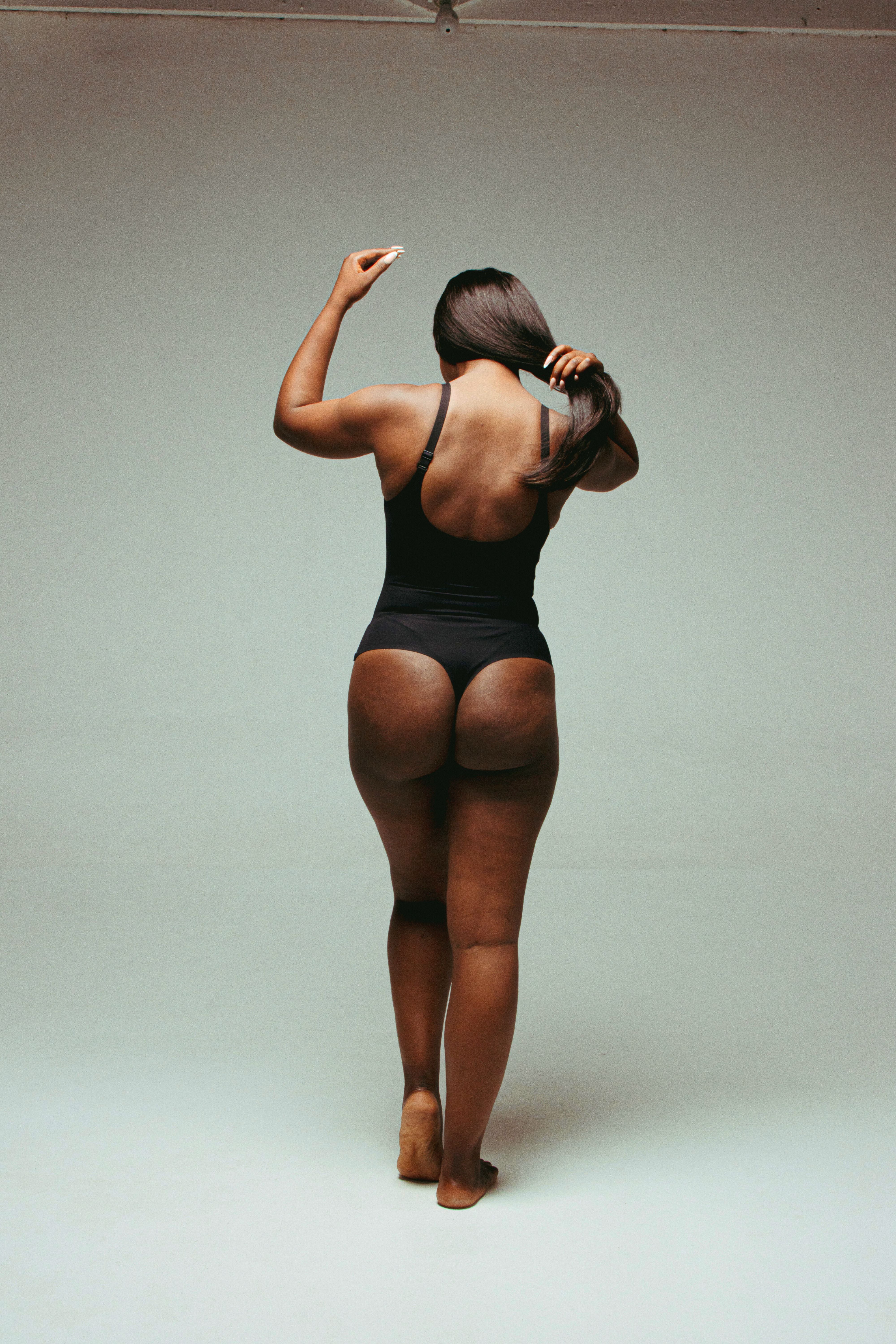 Plunge sculpting bodysuit with adjustable straps by Kurv