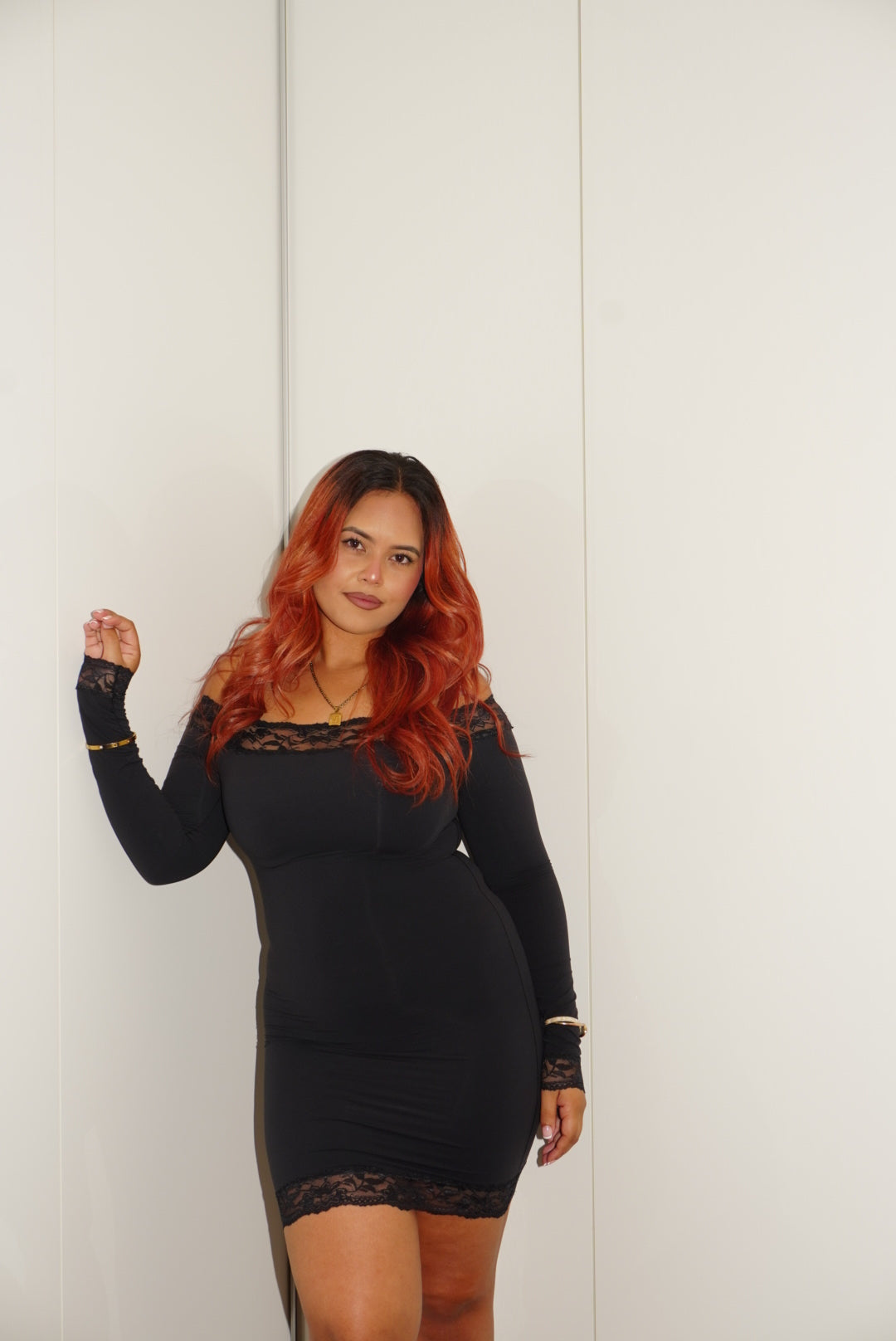 Model wearing After Dark Lace Dress in black by Kurv